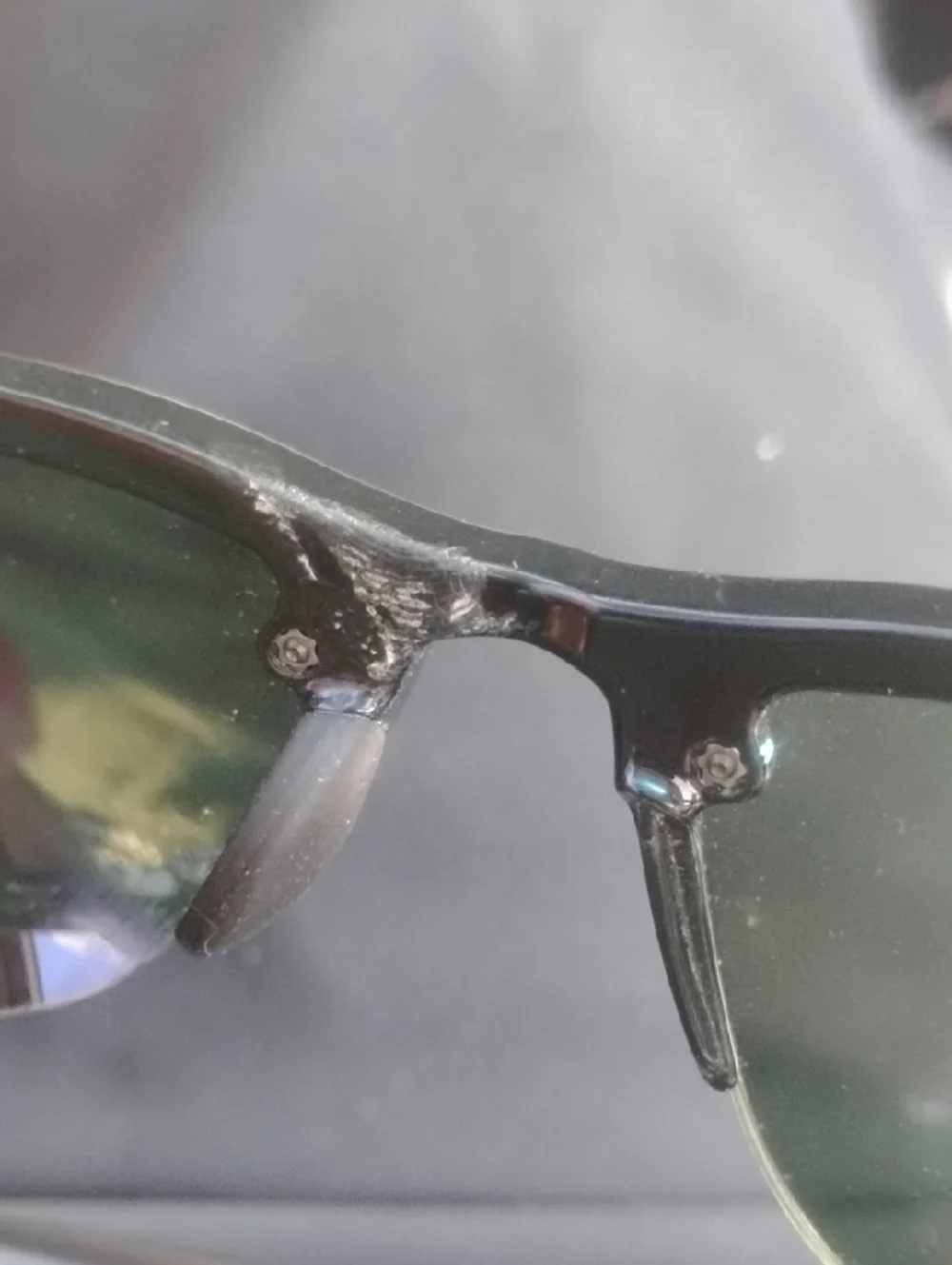 Ray-Ban Black Frame Sunglasses with Reflective Gray-Green Lenses